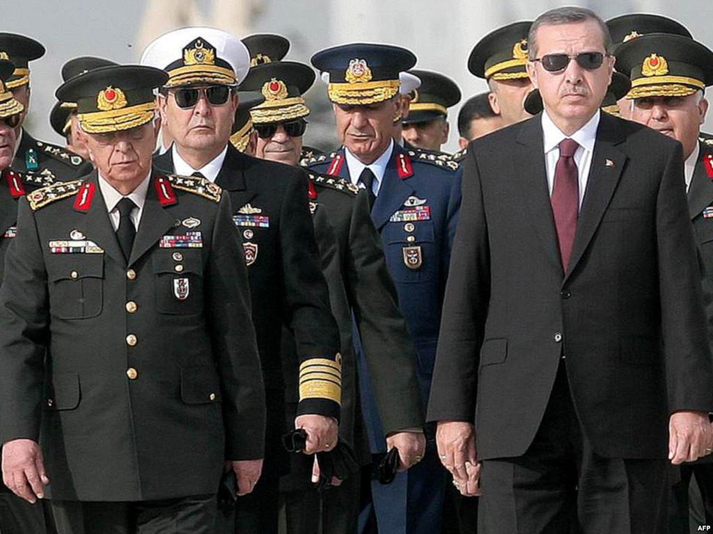 Turkish President Recep Tayyip Erdogan with military officers
