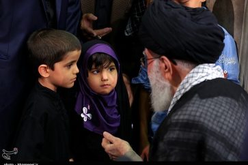 Iran Supreme Leader Ayatollah Sayyed Ali Khamenei with family of Iranian officials martyred in a bombing on June 28, 1981