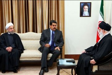 Leader receiving Venezuelan president in the presence of the Iranian president Rouhani