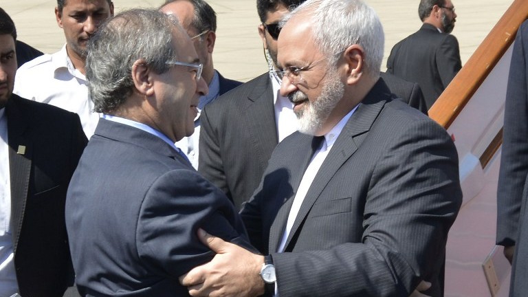 Iranian Foreign Minister Mohammad Javad Zarif receives Syrian Deputy Foreign Minister Faisal Mekdad.