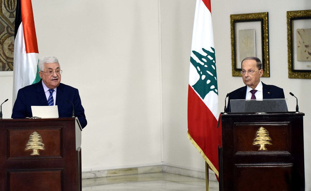 Lebanese President Michel Aoun receives Palestinian counterpart Mahmoud Abbas