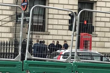 A man is held by police in Westminster after an arrest was made on Whitehall in central London. REUTERS/Kylie MacLellan