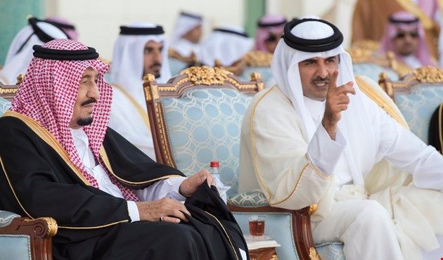 Saudi King Salman and Qatari Emir Tamim Al Thani