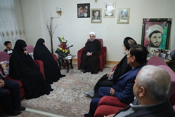 Rouhani visits Iranian martyrs families