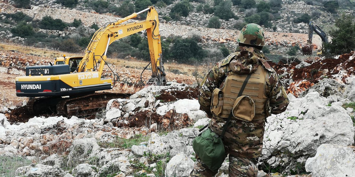 Lebanese soldier guarding Lebanon's border in face of Zionist bulldozer