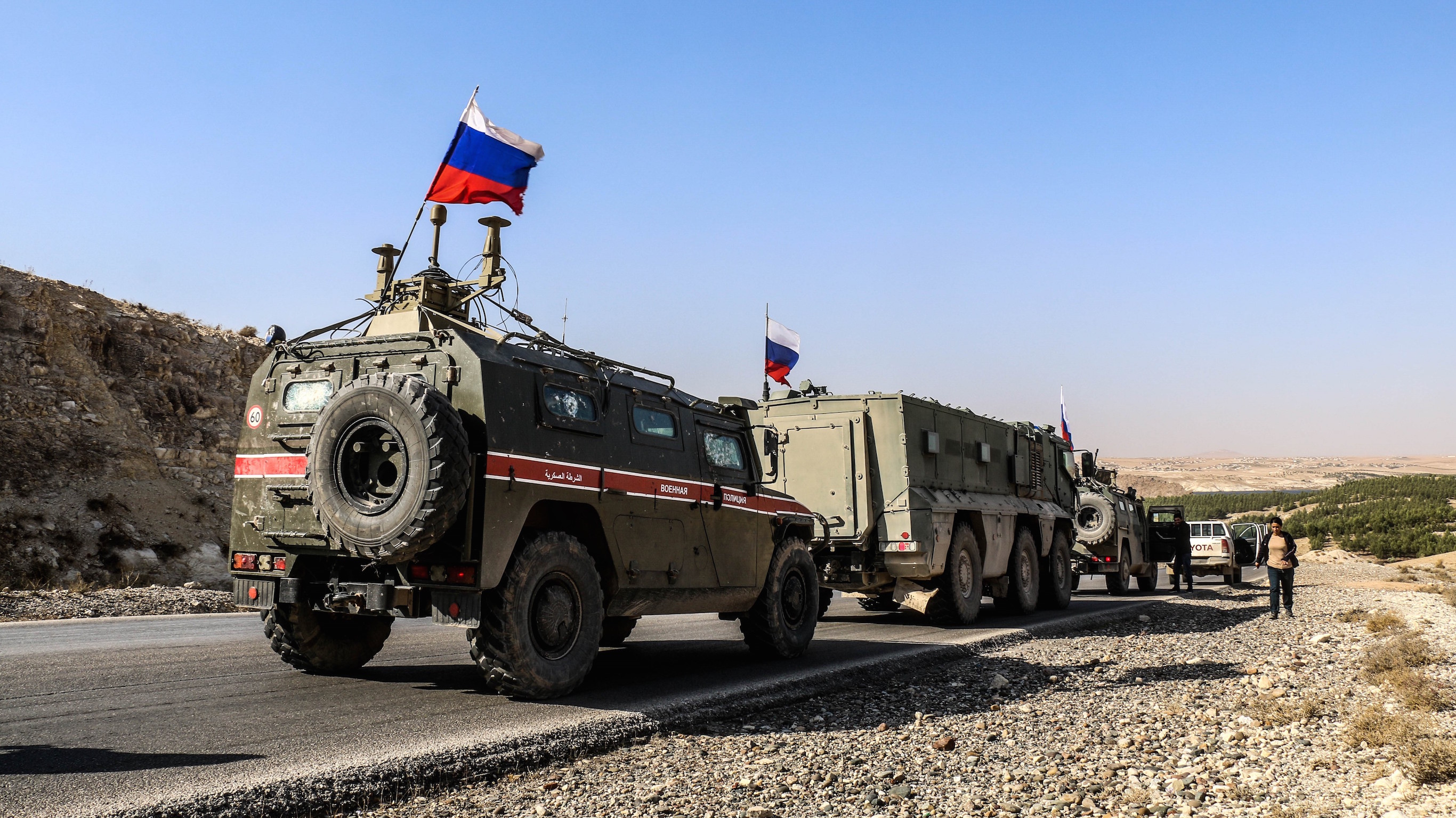 Russian military police as they enter the base at the Tishrin Dam on the Euphrates, 90 kilometers (56 miles) east of Aleppo, Nov. 18, 2019.