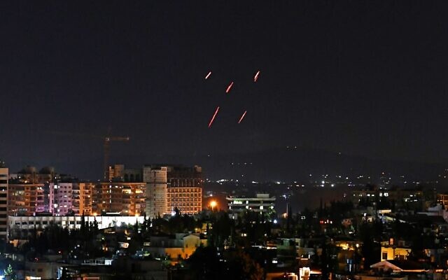 Syria air defenses confronting Israeli missiles