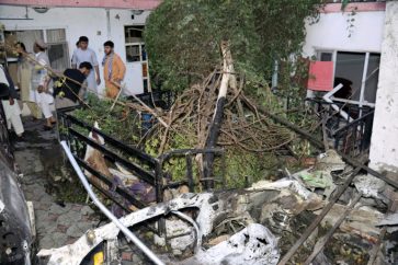 A destroyed vehicle is seen inside a house after a U.S. drone strike in Kabul, Afghanistan, Sunday, Aug. 29, 2021. A U.S. drone strike destroyed a vehicle carrying "multiple suicide bombers" from Afghanistan's Islamic State affiliate on Sunday before they could attack the ongoing military evacuation at Kabul's international airport, American officials said. (AP Photo/Khwaja Tawfiq Sediqi)