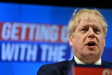Britain's Prime Minister Boris Johnson speaks during the Conservative Party Spring Conference at Blackpool Winter Gardens in Blackpool, northwest England, on March 19, 2022. (Photo by Paul ELLIS / AFP)