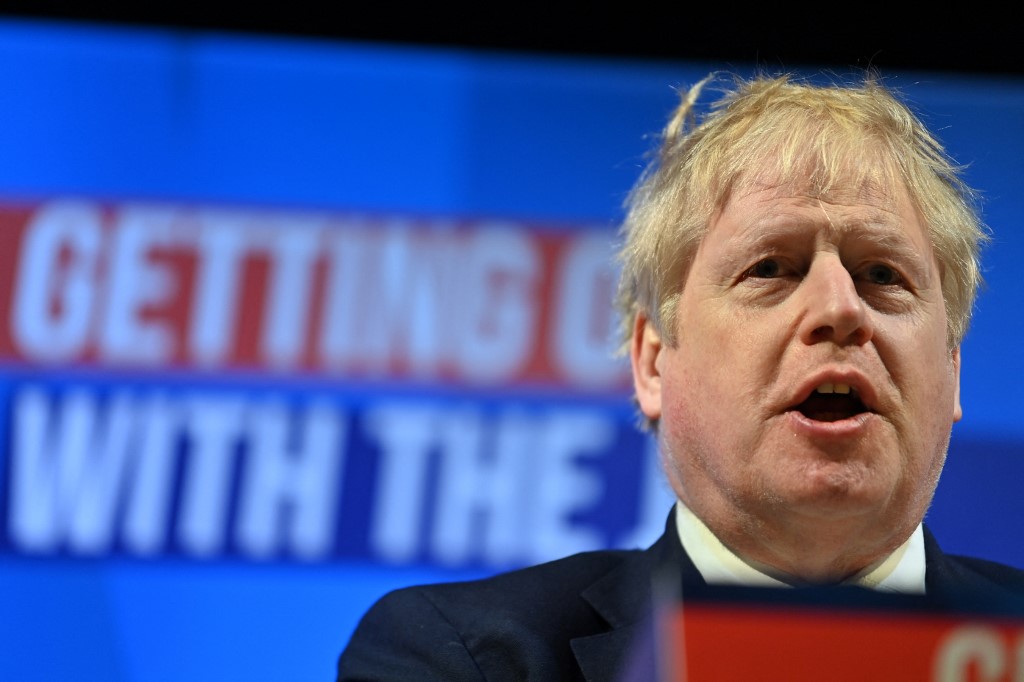 Britain's Prime Minister Boris Johnson speaks during the Conservative Party Spring Conference at Blackpool Winter Gardens in Blackpool, northwest England, on March 19, 2022. (Photo by Paul ELLIS / AFP)