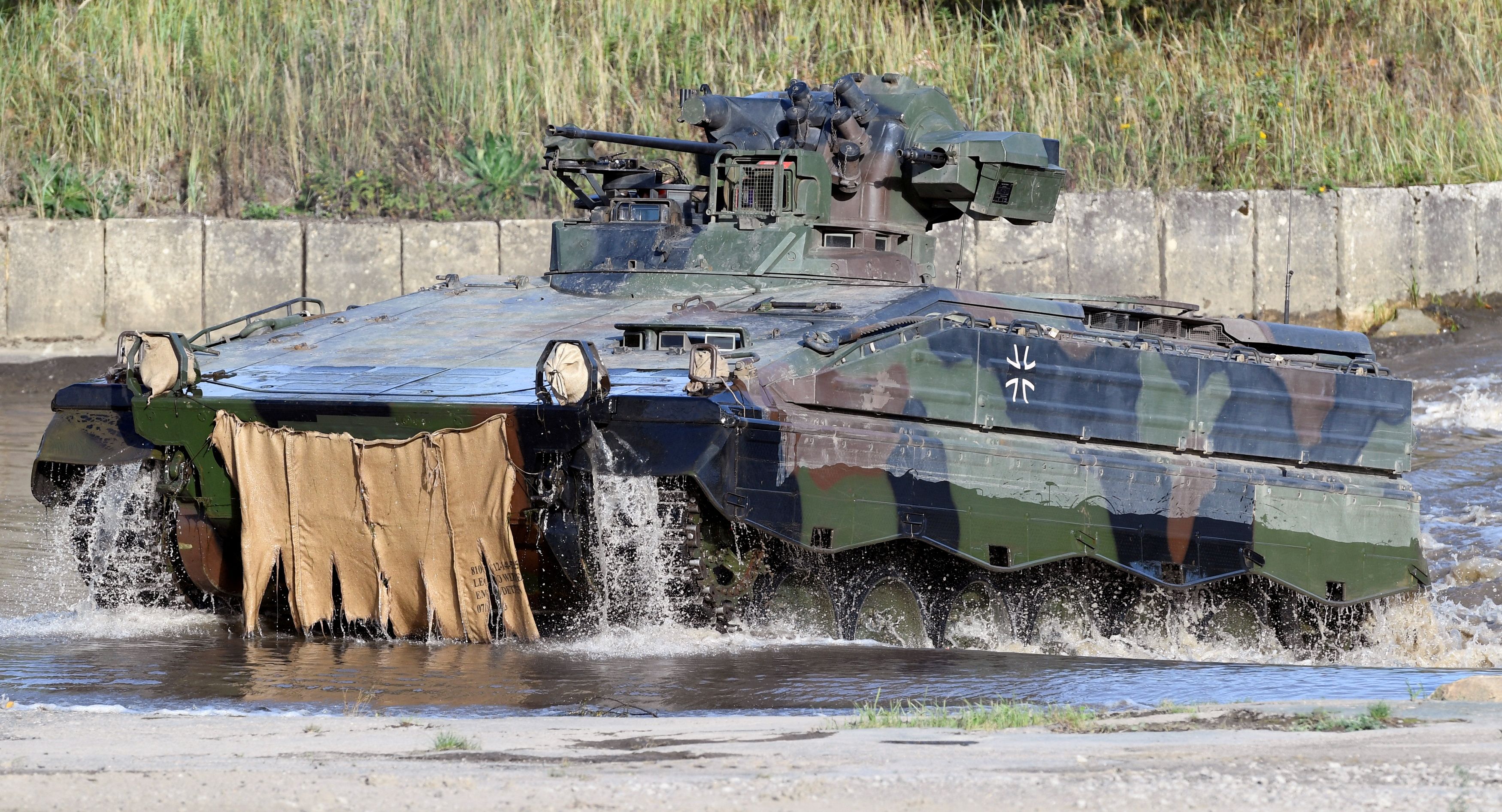 FILE PHOTO: A Marder armoured infantry fighting vehicle of the German army Bundeswehr takes part in an exercise during a media day in Munster, Germany, September 28, 2018. REUTERS/Fabian Bimmer/File Photo