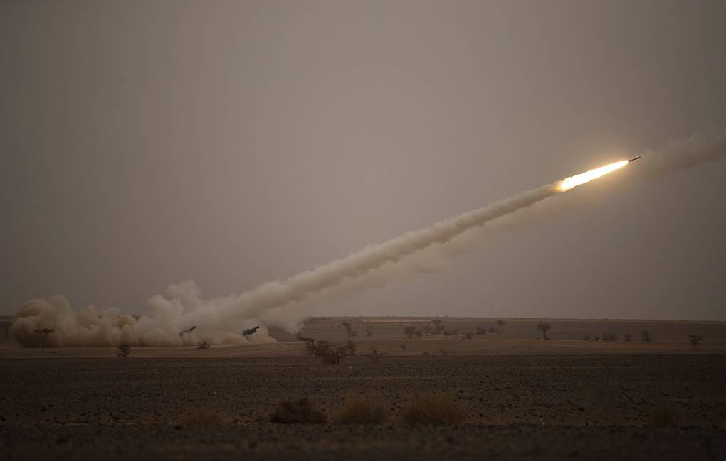 A launch truck fires the High Mobility Artillery Rocket System (HIMARS) at its intended target during the African Lion military exercise in Grier Labouihi complex, southern Morocco, Wednesday, June 9, 2021. With more than 7,000 participants from nine nations and NATO, African Lion is U.S. Africa Command's largest exercise. (AP Photo/Mosa'ab Elshamy)
