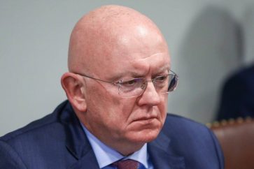 NEW YORK CITY, USA - SEPTEMBER 23, 2021: Russia's Permanent Representative to the UN Vasily Nebenzya looks on during a meeting of Russia's Foreign Minister Sergei Lavrov with his Japanese counterpart Toshimitsu Motegi on the sidelines of the 76th session of the United Nations General Assembly. Russian Foreign Ministry/TASSÑØÀ. Íüþ-Éîðê. Ïîñòîÿííûé ïðåäñòàâèòåëü Ðîññèè ïðè ÎÎÍ Âàñèëèé Íåáåíçÿ âî âðåìÿ âñòðå÷è ìèíèñòðà èíîñòðàííûõ äåë ÐÔ ÑåðãåÿËàâðîâà ñ ìèíèñòðîì èíîñòðàííûõ äåë ßïîíèè Òîñèìèöó Ìîòýãè íà ïîëÿõ Ãåíàññàìáëåè ÎÎÍ. Ïðåññ-ñëóæáà ÌÈÄ ÐÔ/ÒÀÑÑ