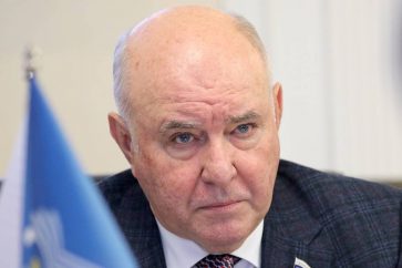 MOSCOW, RUSSIA - SEPTEMBER 17, 2021: The Chairman of the Russian Federation Council's International Affairs Committee, Grigory Karasin during a meeting with foreign observers in the 2021 Russian parliamentary election, at the Russian Federation Council. Russia holds legislative elections on 17-19 September 2021; voters will go to the polls to elect members of the Russian State Duma. Mikhail Tereshchenko/TASSÐîññèÿ. Ìîñêâà. Ïðåäñåäàòåëü êîìèòåòà Ñîâåòà Ôåäåðàöèè ÐÔ ïî ìåæäóíàðîäíûì äåëàì Ãðèãîðèé Êàðàñèí âî âðåìÿ âñòðå÷è ñ çàðóáåæíûìè íàáëþäàòåëÿìè çà âûáîðàìè â Ñîâåòå Ôåäåðàöèè ÐÔ. Âûáîðû â Ãîñäóìó ÐÔ âîñüìîãî ñîçûâà, íàçíà÷åííûå íà Åäèíûé äåíü ãîëîñîâàíèÿ 19 ñåíòÿáðÿ 2021 ãîäà, ïðîõîäÿò â òå÷åíèå òðåõ äíåé  17, 18 è 19 ñåíòÿáðÿ. Ìèõàèë Òåðåùåíêî/ÒÀÑÑ