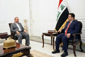 Iraqi Prime Minister Mohammed Shia Al-Sudan hosting Iranian ambassador to Baghdad Mohammad Kazem Al-e Sadegh