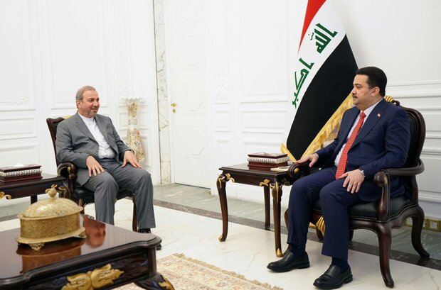 Iraqi Prime Minister Mohammed Shia Al-Sudan hosting Iranian ambassador to Baghdad Mohammad Kazem Al-e Sadegh