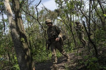 © AP Photo/Evgeniy Maloletka