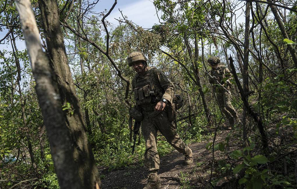 © AP Photo/Evgeniy Maloletka