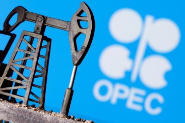 FILE PHOTO: A 3D-printed oil pump jack is seen in front of a displayed OPEC logo in this illustration picture, April 14, 2020. REUTERS/Dado Ruvic