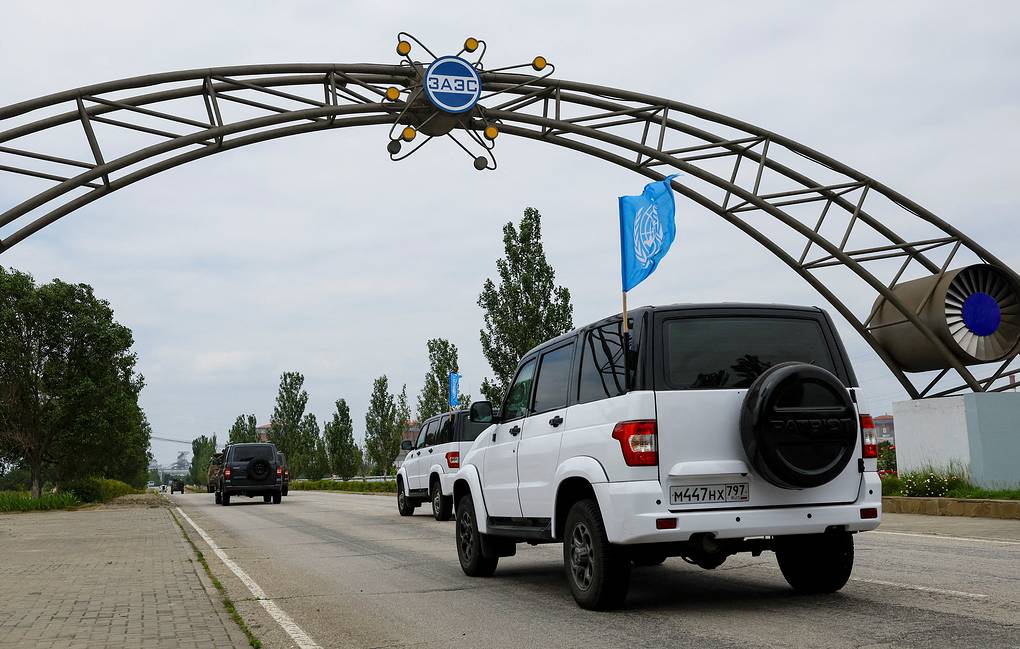 A motorcade transporting members of the International Atomic Energy Agency (IAEA) expert mission, escorted by the Russian military, drives towards the Zaporizhzhia Nuclear Power Plant. August 4, 2023