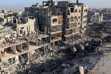 TOPSHOT - A general view shows destroyed building and the rubble of the al-Faruq mosque on February 22, 2024, following an overnight Israeli air strike in Rafah refugee camp in the southern Gaza Strip, amid continuing battles between Israel and the Palestinian group Hamas. (Photo by SAID KHATIB / AFP)