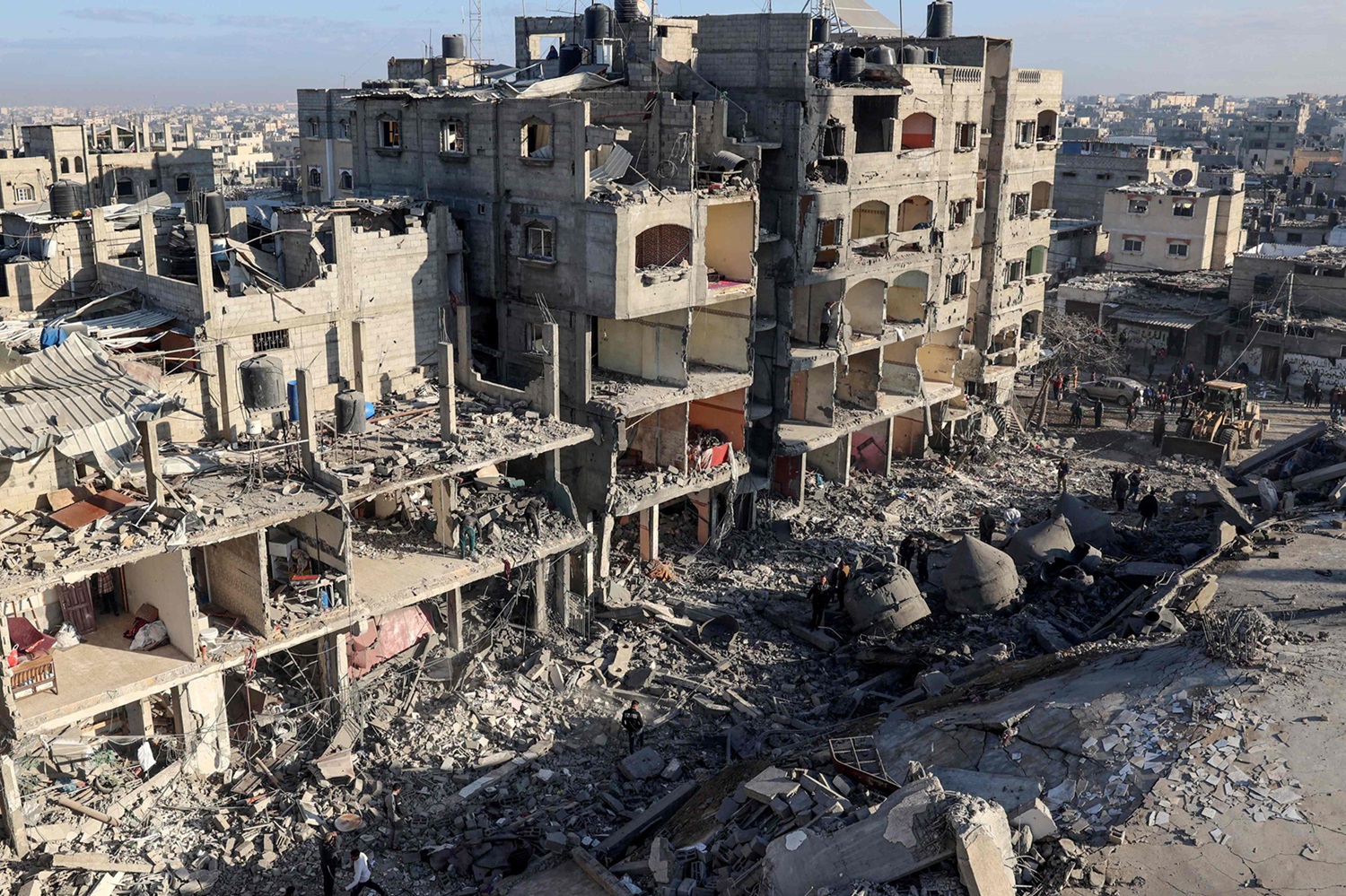 TOPSHOT - A general view shows destroyed building and the rubble of the al-Faruq mosque on February 22, 2024, following an overnight Israeli air strike in Rafah refugee camp in the southern Gaza Strip, amid continuing battles between Israel and the Palestinian group Hamas. (Photo by SAID KHATIB / AFP)