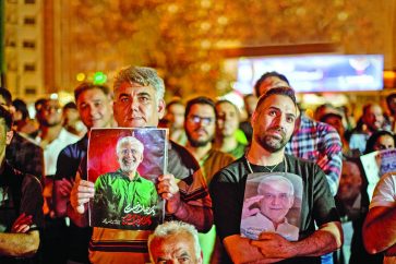 Iranians choose their next president in a runoff election