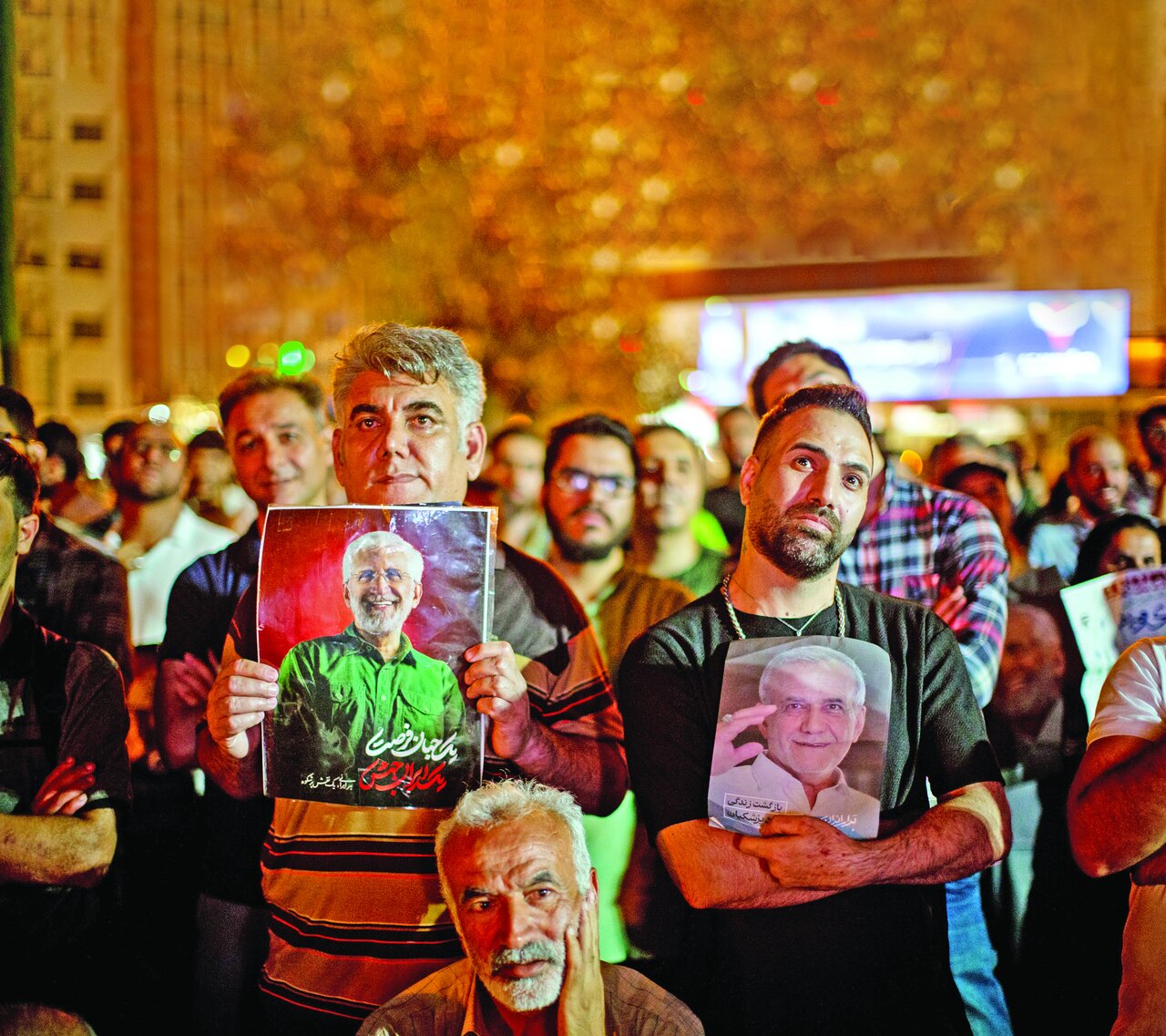 Iranians choose their next president in a runoff election