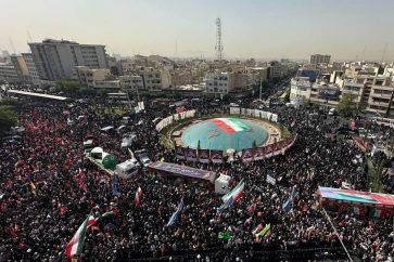 Large crowds of people are seen at Enqelab Square in the downtown Iranian capital of Tehran on June 28, 2025