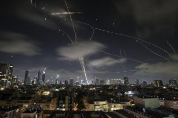 Iranian missiles clash with interceptor missiles in Tel Aviv skies