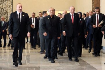 President Masoud Pezeshkian (C) flanked by Turkey's Recep Tayyip Erdogan (R) and Azerbaijan's Ilham Aliyev, July 4, 2025.