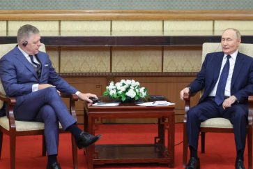 Slovakia’s Robert Fico, left, and Russia's Vladimir Putin pictured in Beijing on Tuesday, September 2, 2025 (image by AP).